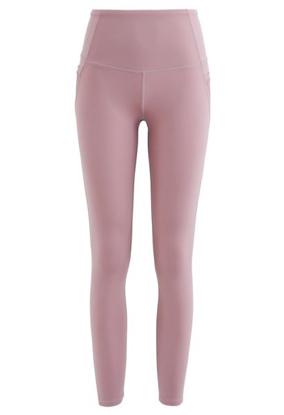Leggings tobilleros con detalle de costuras de tiro alto y bolsillos de malla en rosa polvoriento