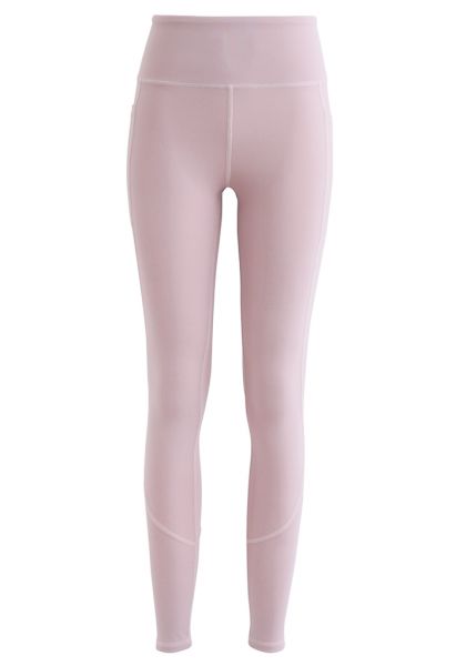Leggings tobilleros con detalle de costura y bolsillos laterales en rosa nude